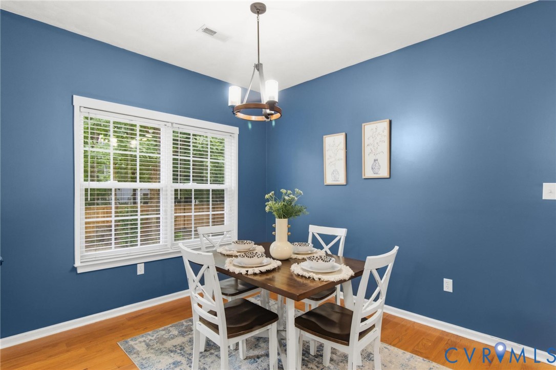 7807 Clover Ridge Place Chesterfield, VA 23832 - Photo 13 of 51 Dining area featuring rich blue walls, hardwood fl