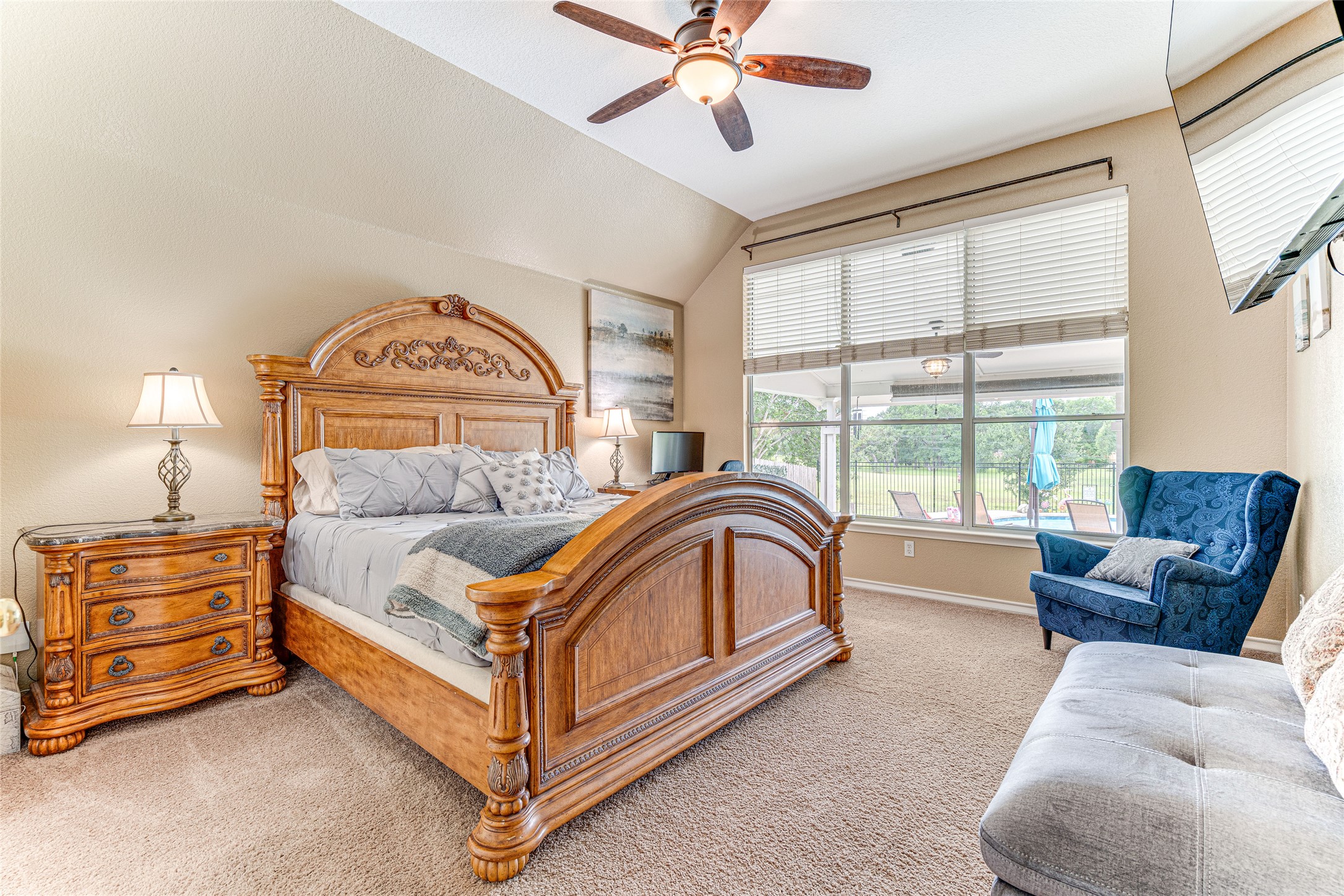 1209 Lacey Oak Loop Round Rock, TX 78681 - Photo 17 of 22 Bedroom featuring a vaulted ceiling and a ceiling fan with integrated lighting