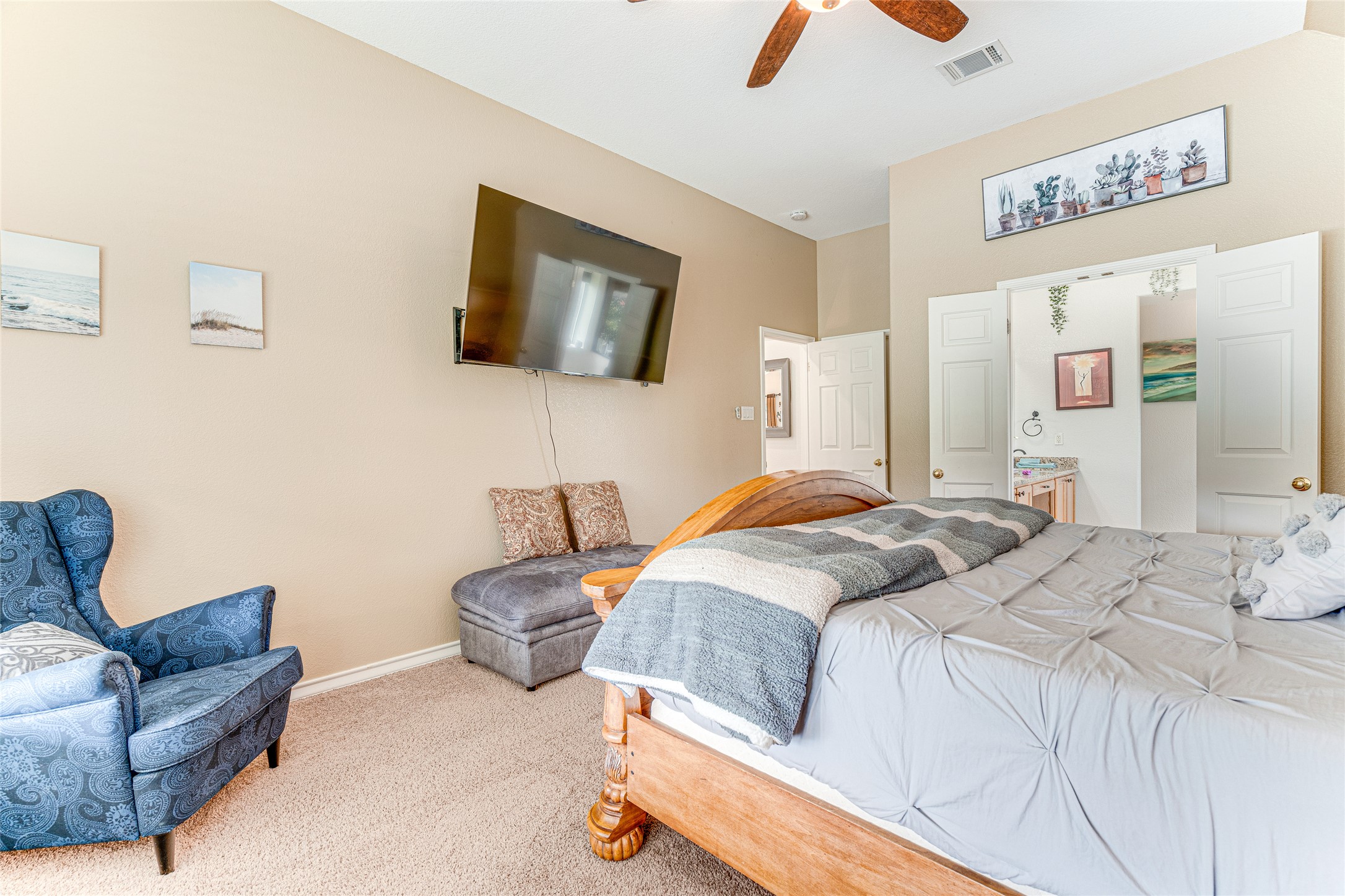 1209 Lacey Oak Loop Round Rock, TX 78681 - Photo 18 of 22 Carpeted sleeping area featuring a vaulted ceiling and a ceiling fan