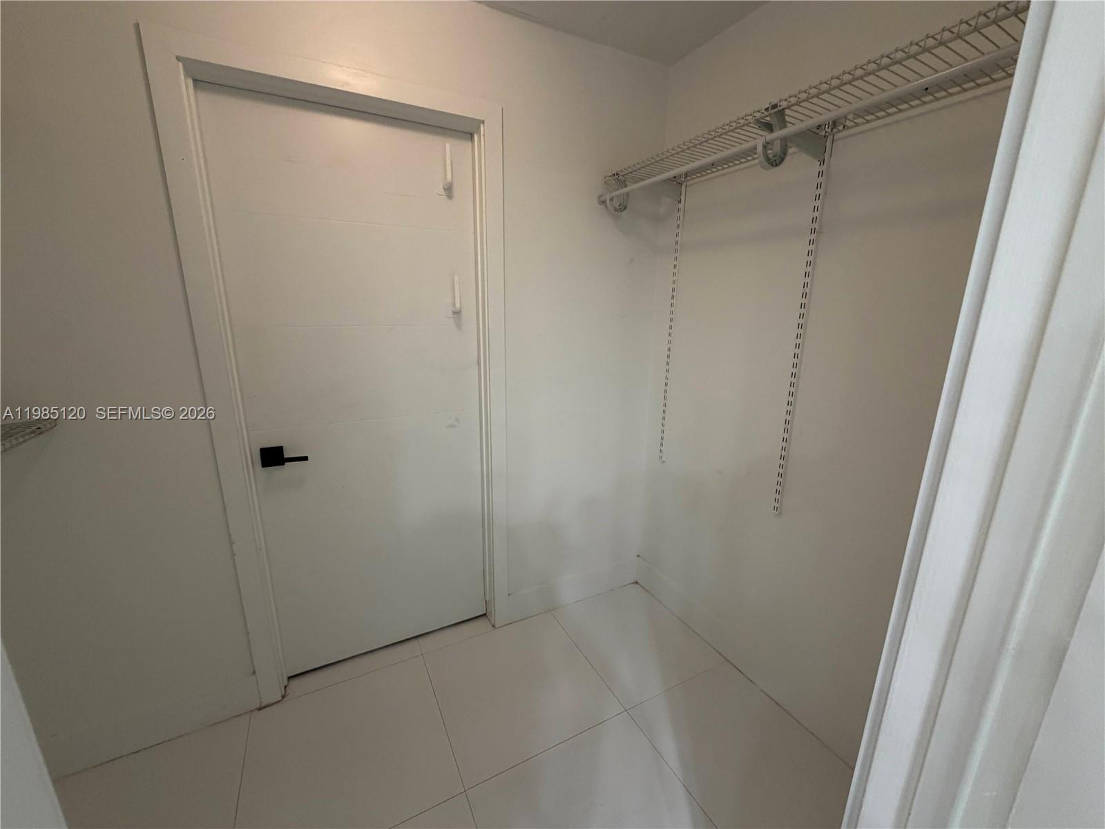 18328 Northwest 68th Avenue, Unit I Hialeah, FL 33015 - Photo 11 of 15 a view of a small space