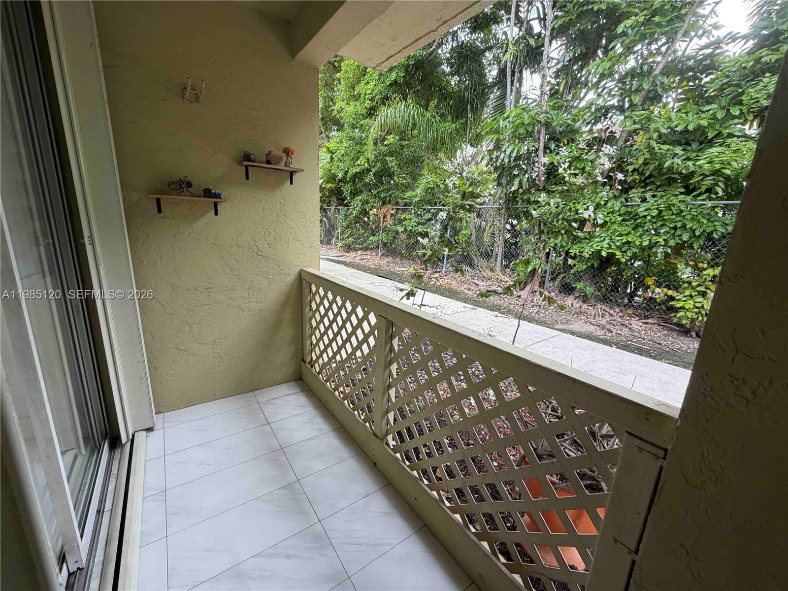 18328 Northwest 68th Avenue, Unit I Hialeah, FL 33015 - Photo 14 of 15 a view of balcony