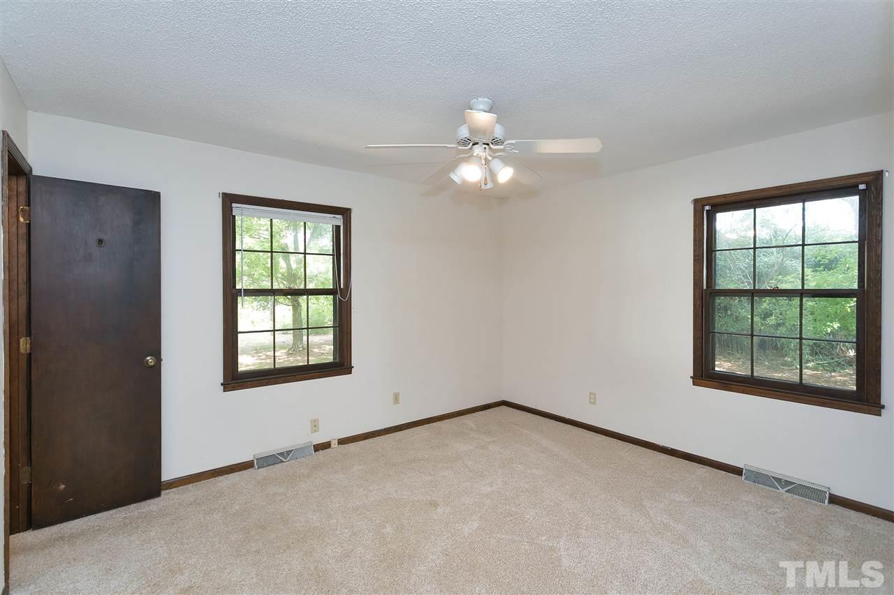10036 Ten-Ten Road Raleigh, NC 27603 - Photo 14 of 25 an empty room with a window