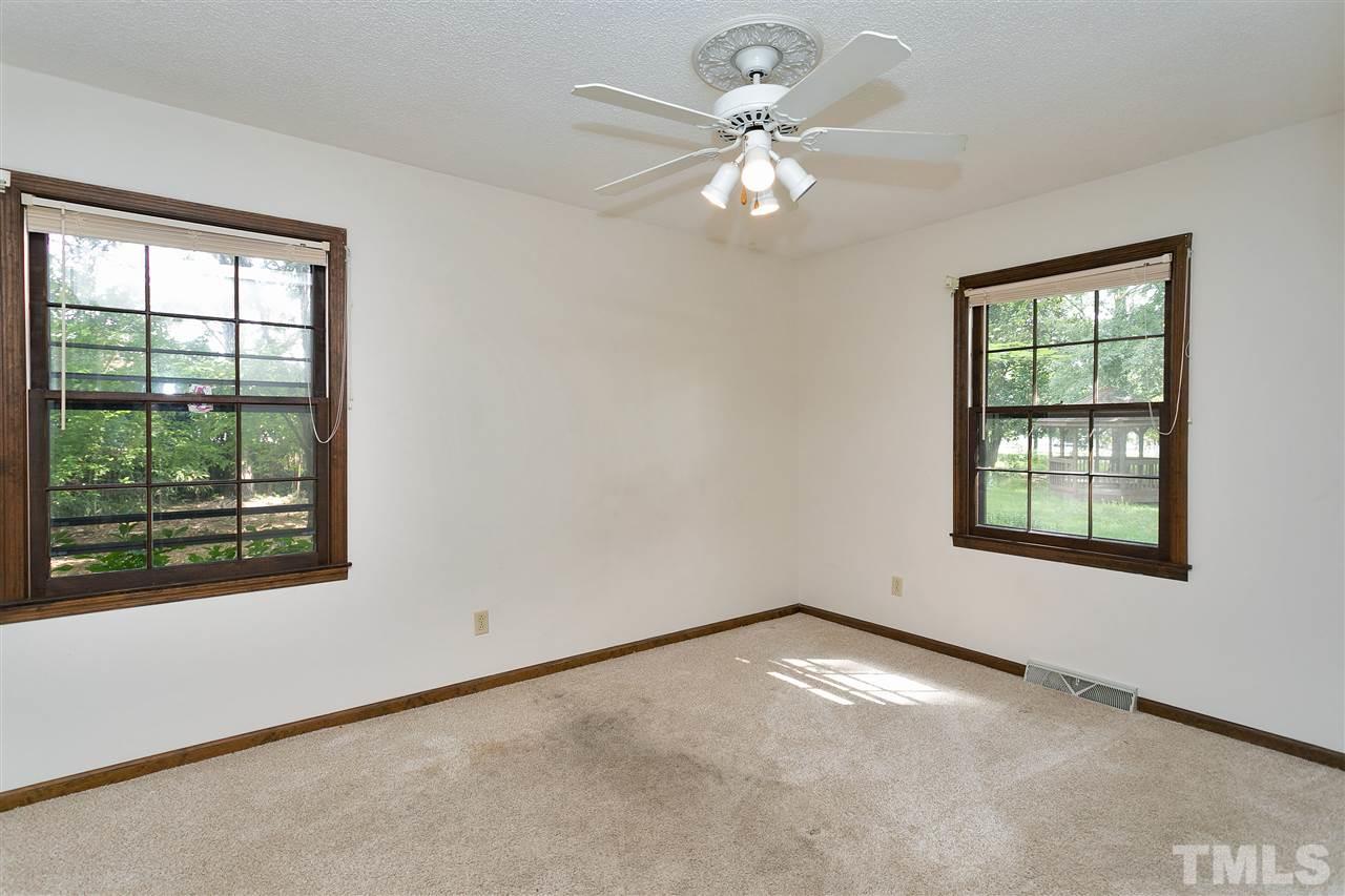 10036 Ten-Ten Road Raleigh, NC 27603 - Photo 17 of 25 an empty room with a window