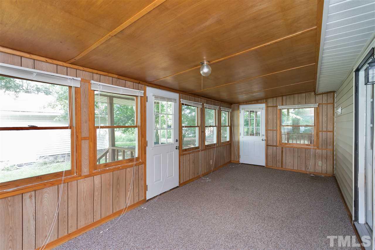 10036 Ten-Ten Road Raleigh, NC 27603 - Photo 19 of 25 a view of an empty room with a window
