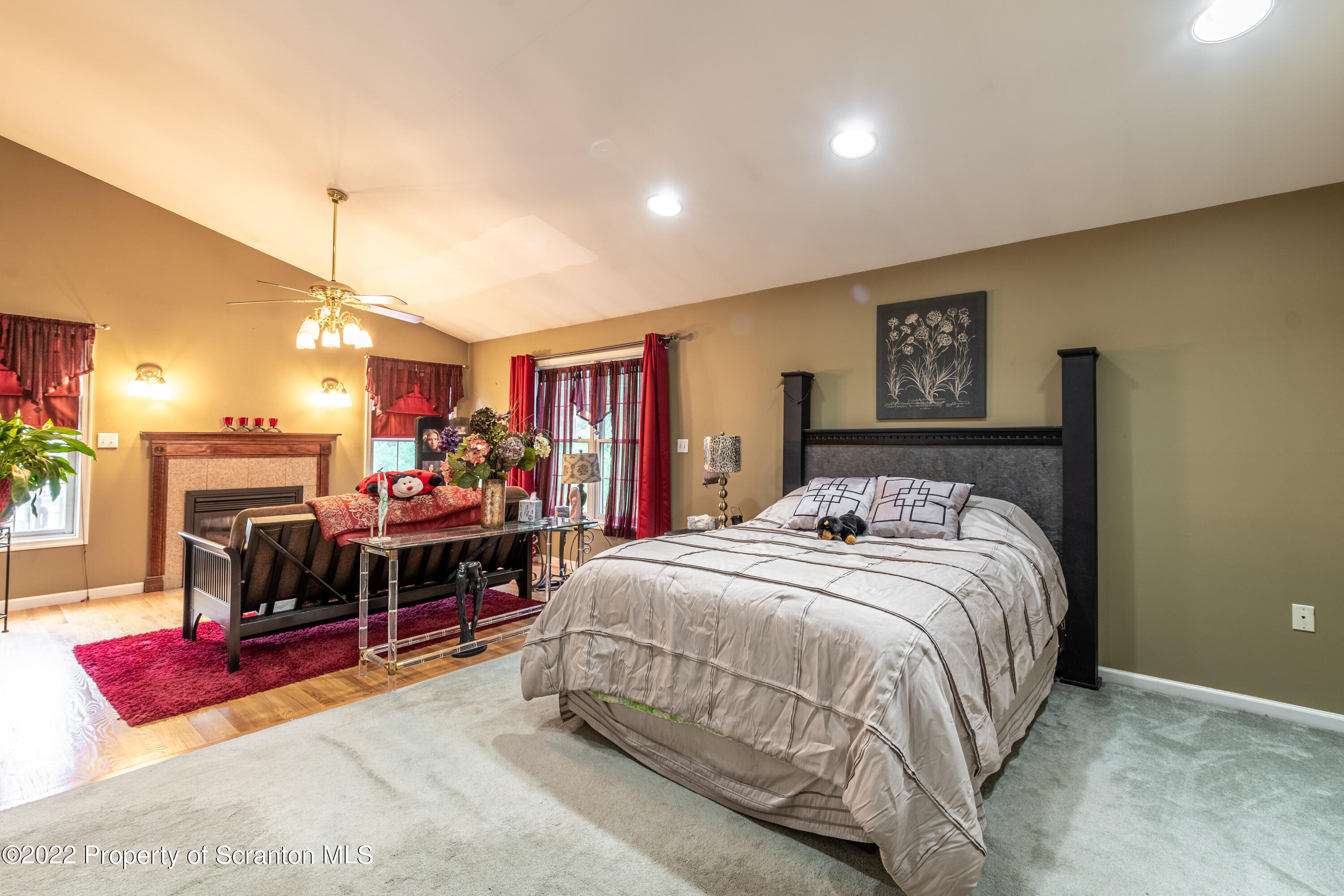 112 Blackberry Lane Duryea, PA 18642 - Photo 19 of 29 a bedroom with a bed and a table with the kitchen view