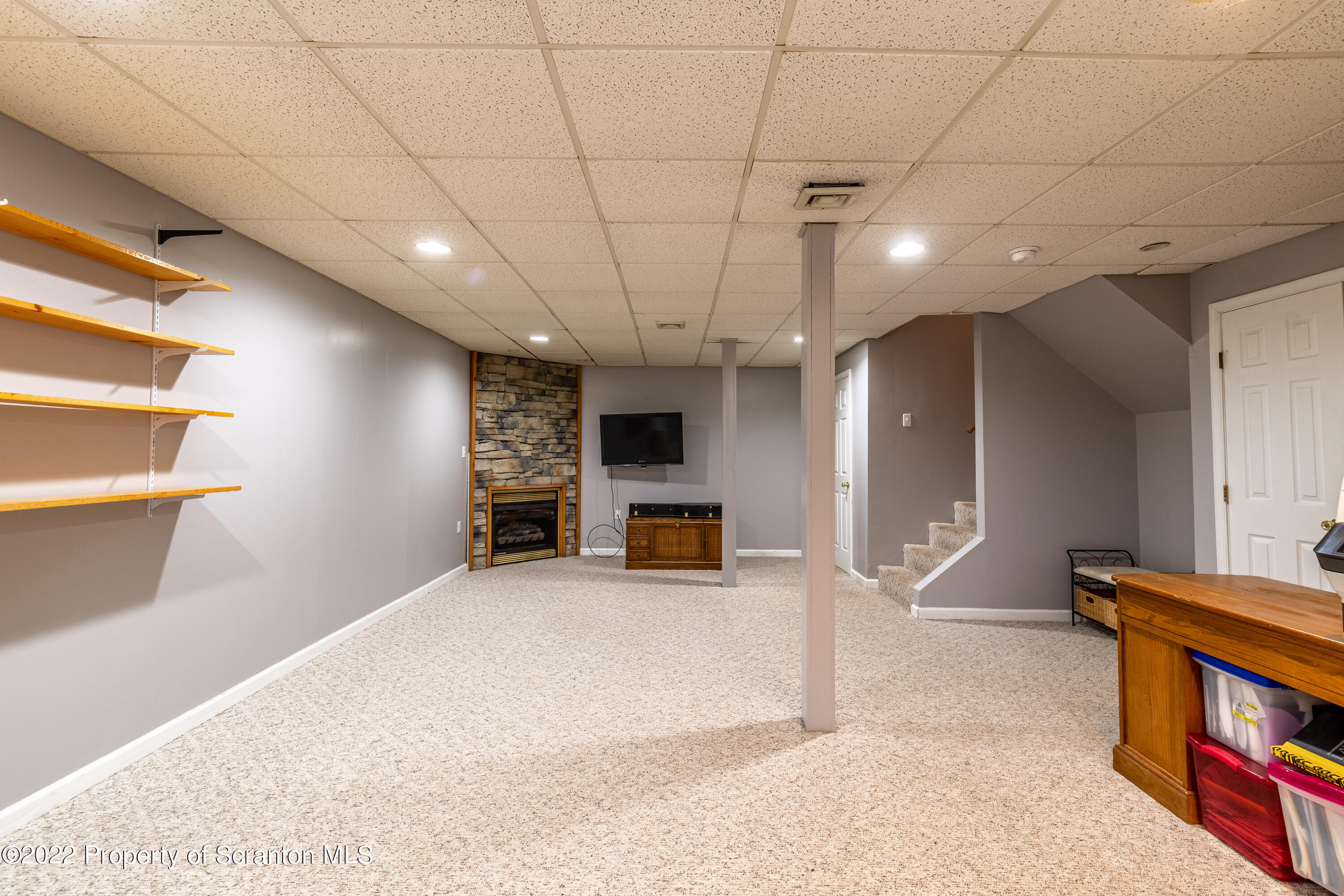 112 Blackberry Lane Duryea, PA 18642 - Photo 24 of 29 a view of a livingroom with an empty space and a fireplace