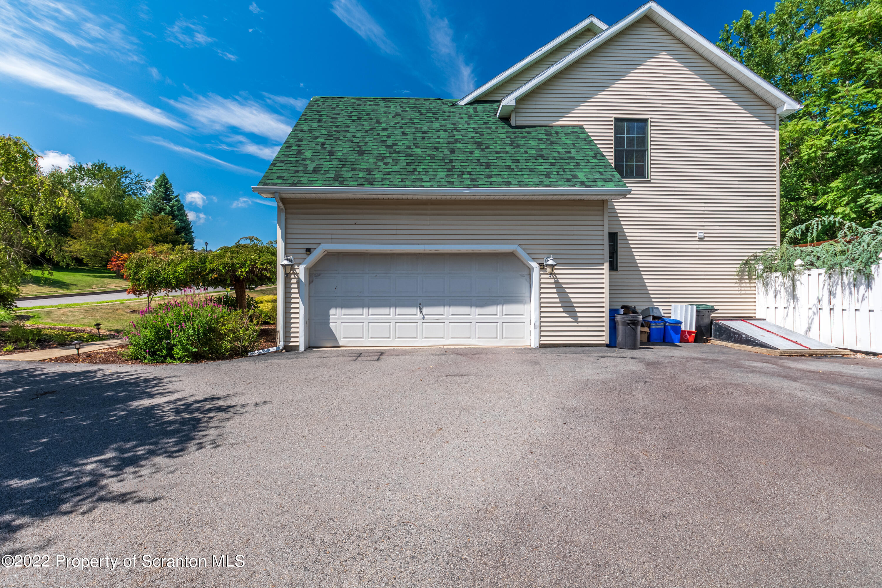112 Blackberry Lane Duryea, PA 18642 - Photo 3 of 29 a front view of a house with a yard and garage