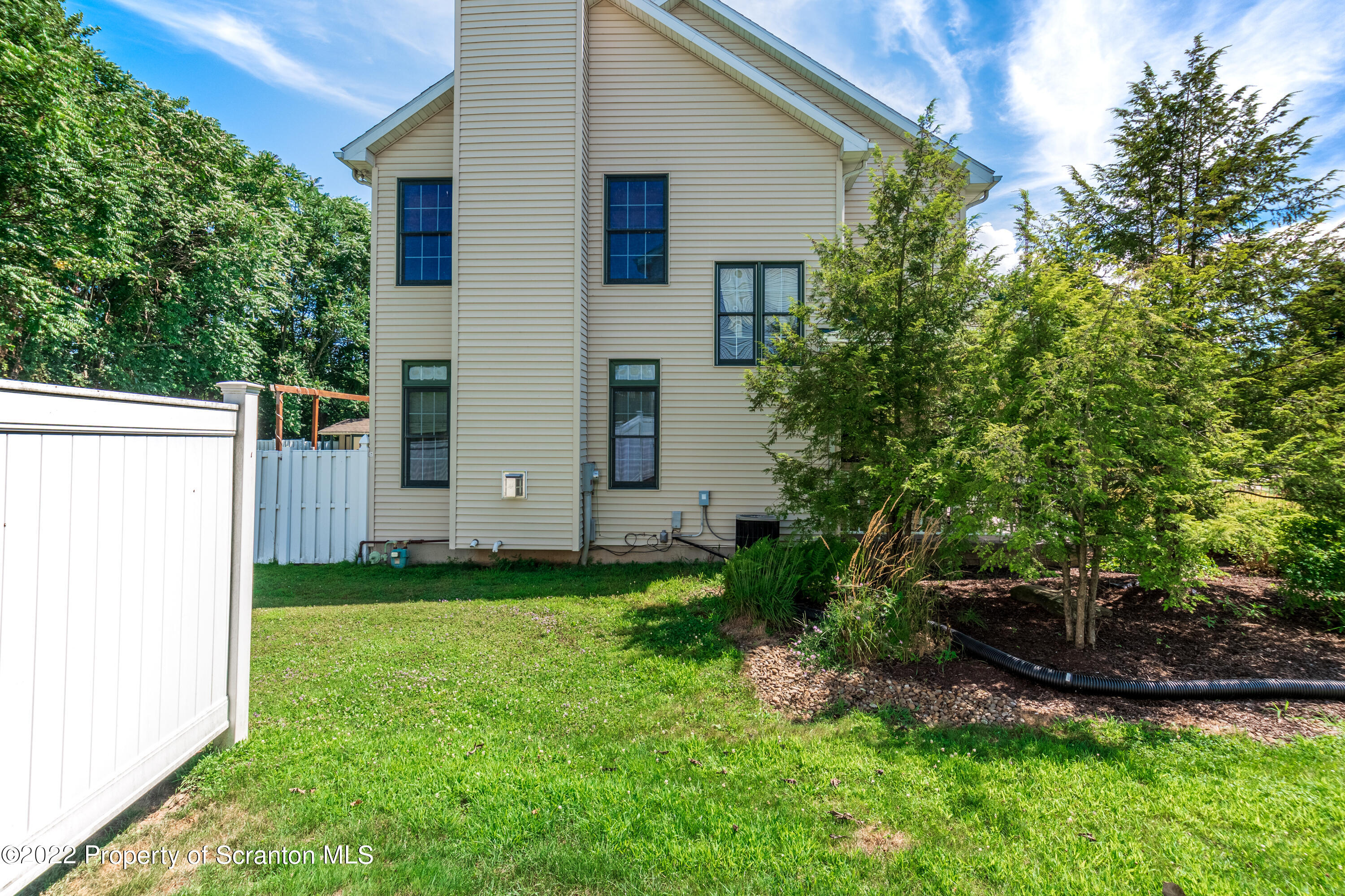112 Blackberry Lane Duryea, PA 18642 - Photo 4 of 29 a view of a back yard of the house