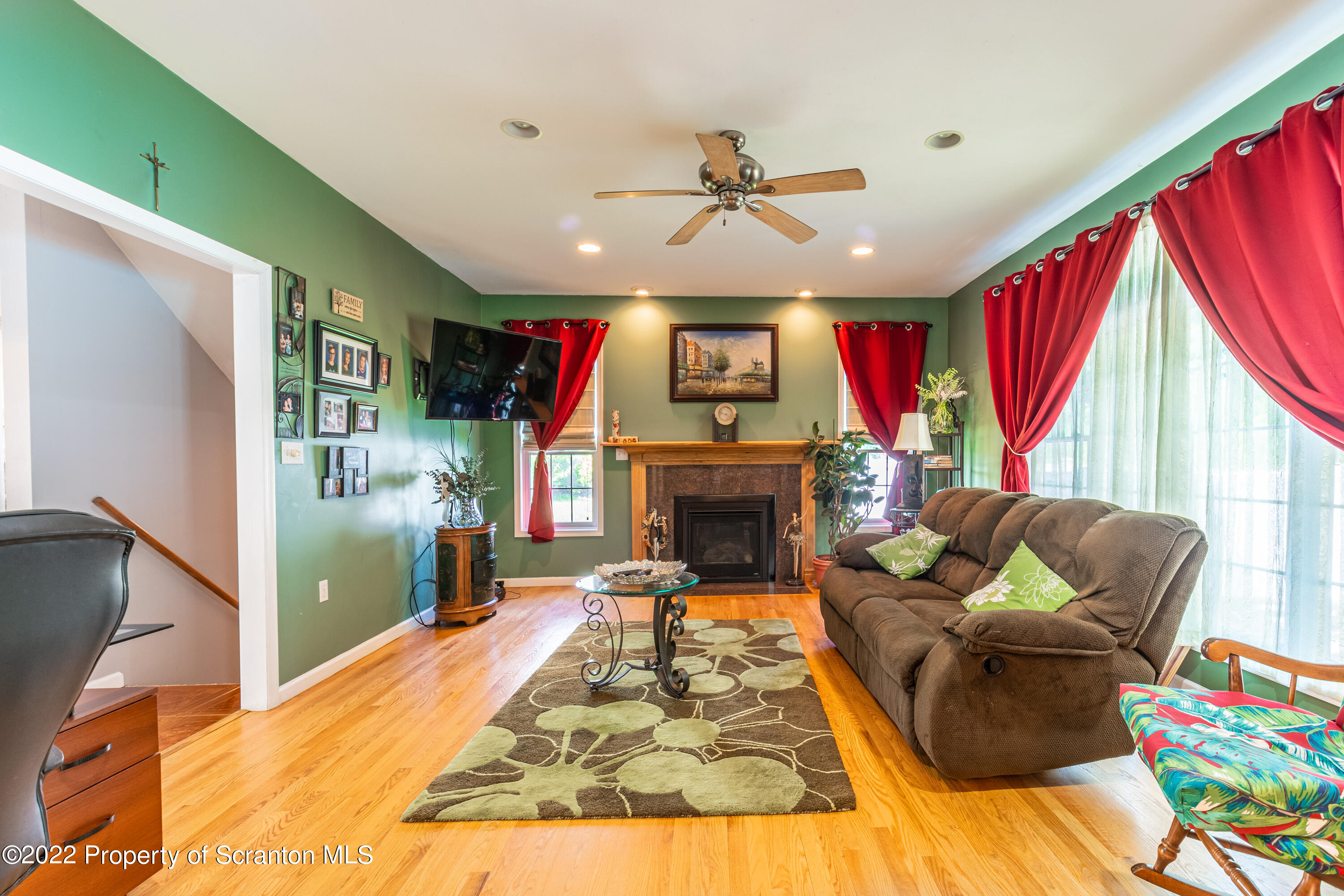 112 Blackberry Lane Duryea, PA 18642 - Photo 6 of 29 a living room with furniture fireplace and a large window