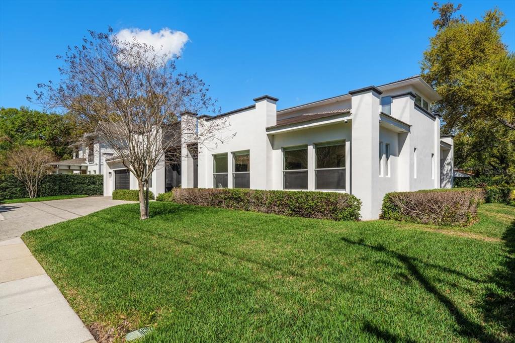 3901 West Granada Street Tampa, FL 33629 - Photo 2 of 45 a view of a house with a yard