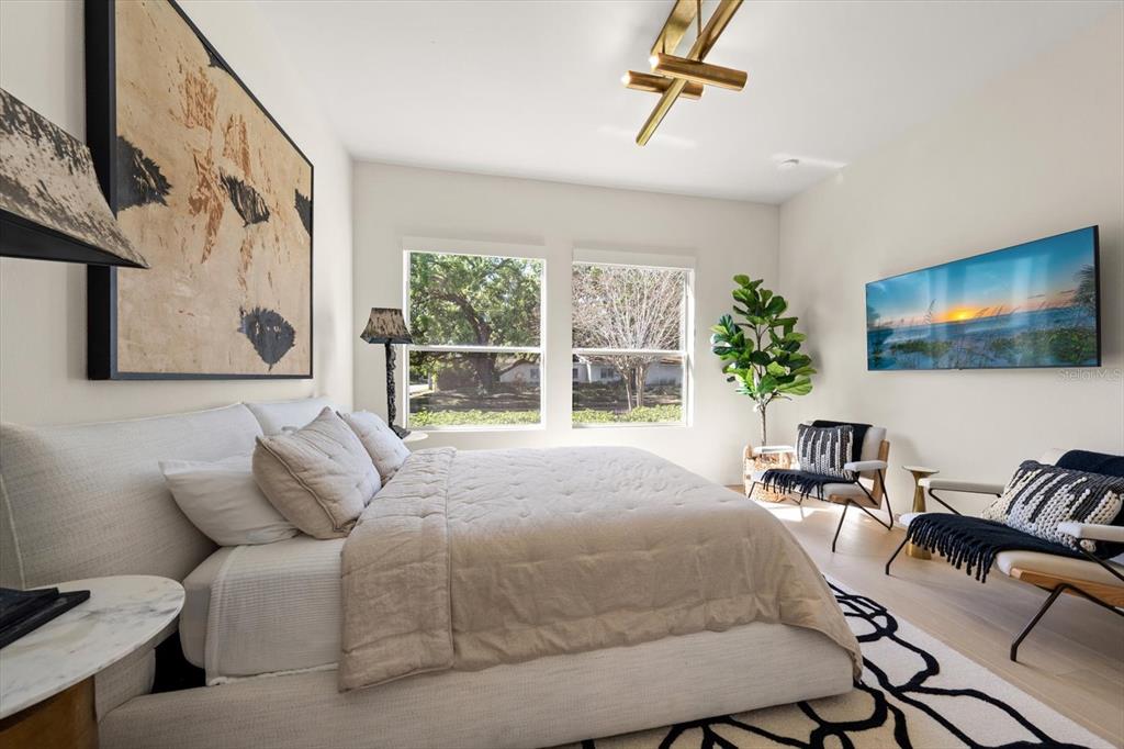 3901 West Granada Street Tampa, FL 33629 - Photo 25 of 45 a bedroom with a bed window and couch