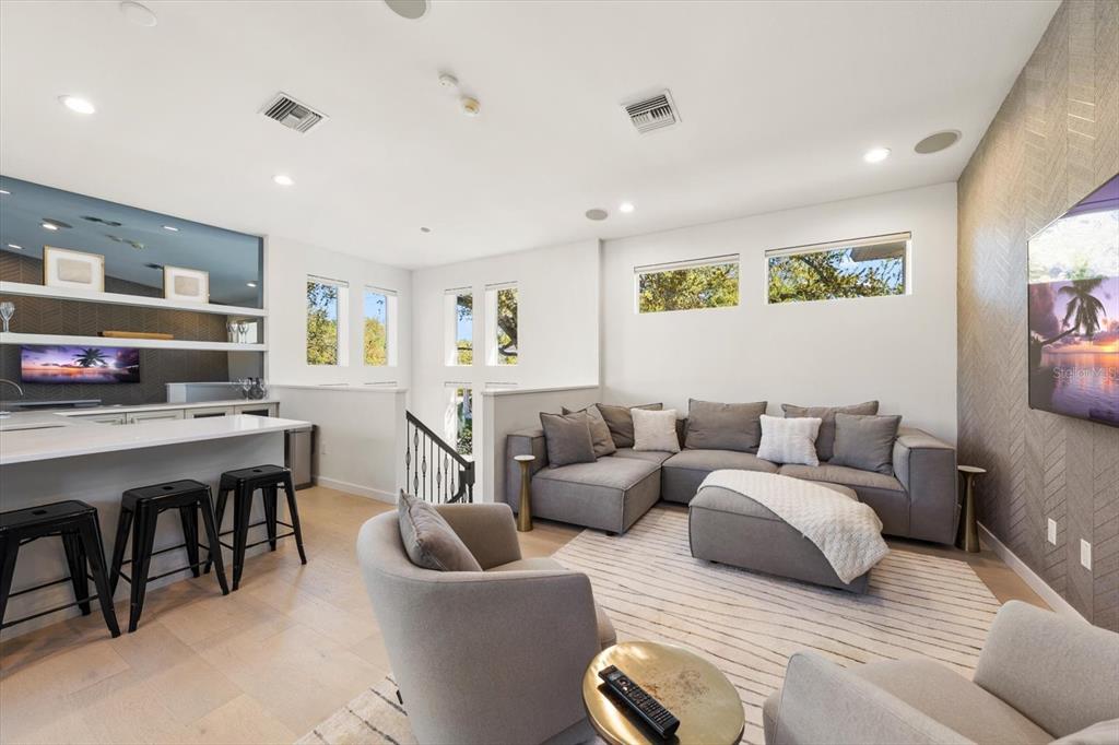 3901 West Granada Street Tampa, FL 33629 - Photo 33 of 45 a living room with furniture kitchen view and a window