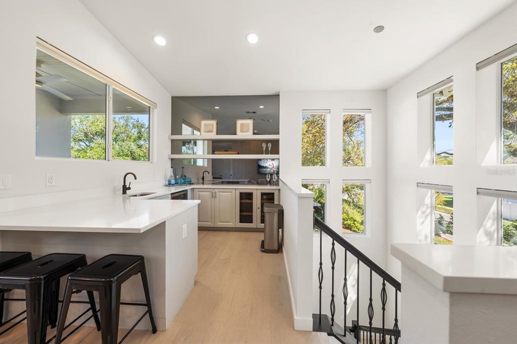 3901 West Granada Street Tampa, FL 33629 - Photo 34 of 45 a kitchen with stainless steel appliances a sink a stove and a refrigerator