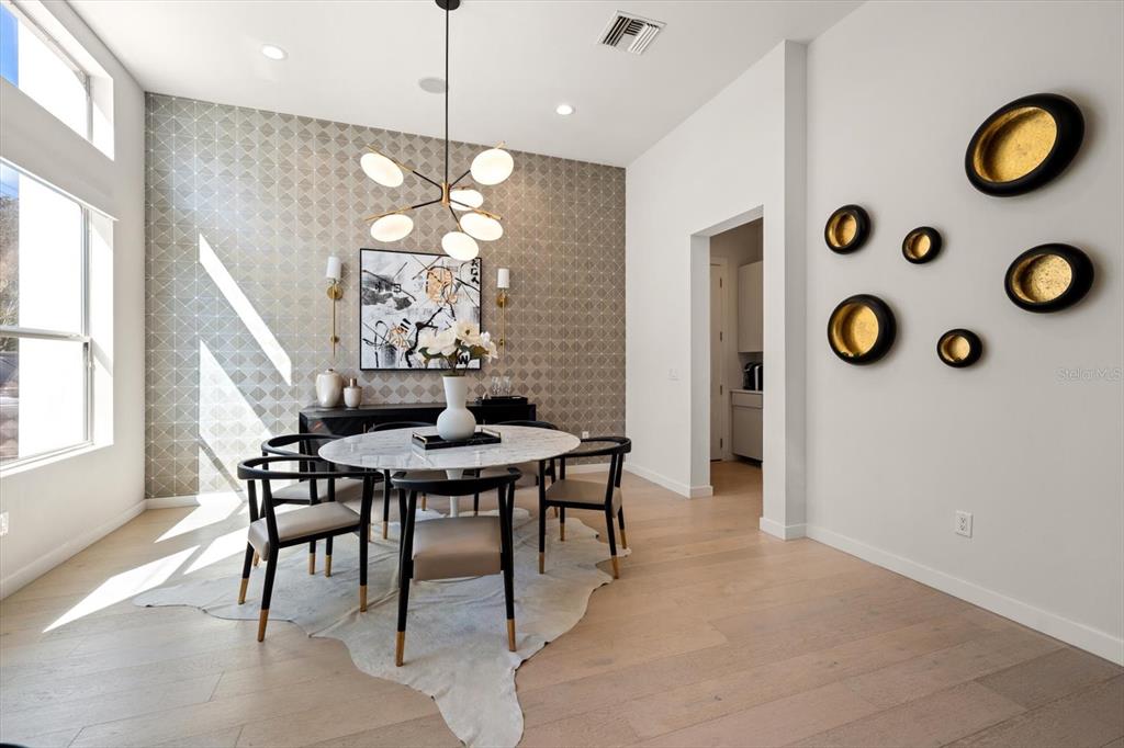 3901 West Granada Street Tampa, FL 33629 - Photo 5 of 45 a view of a dining room with furniture and chandelier
