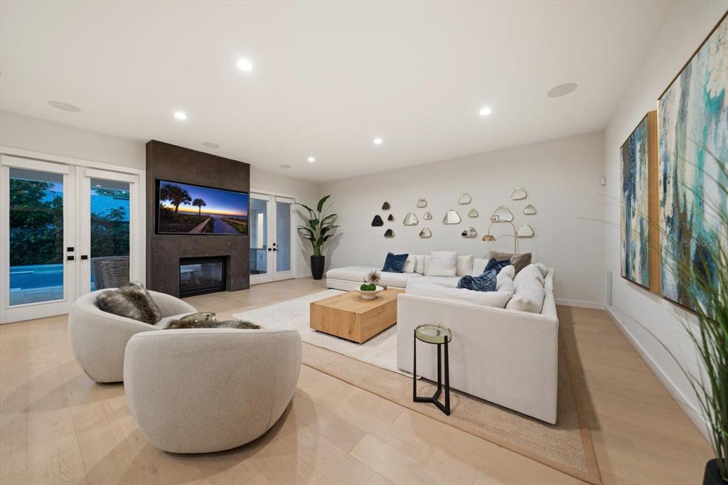 3901 West Granada Street Tampa, FL 33629 - Photo 7 of 45 a living room with fireplace furniture and a large window