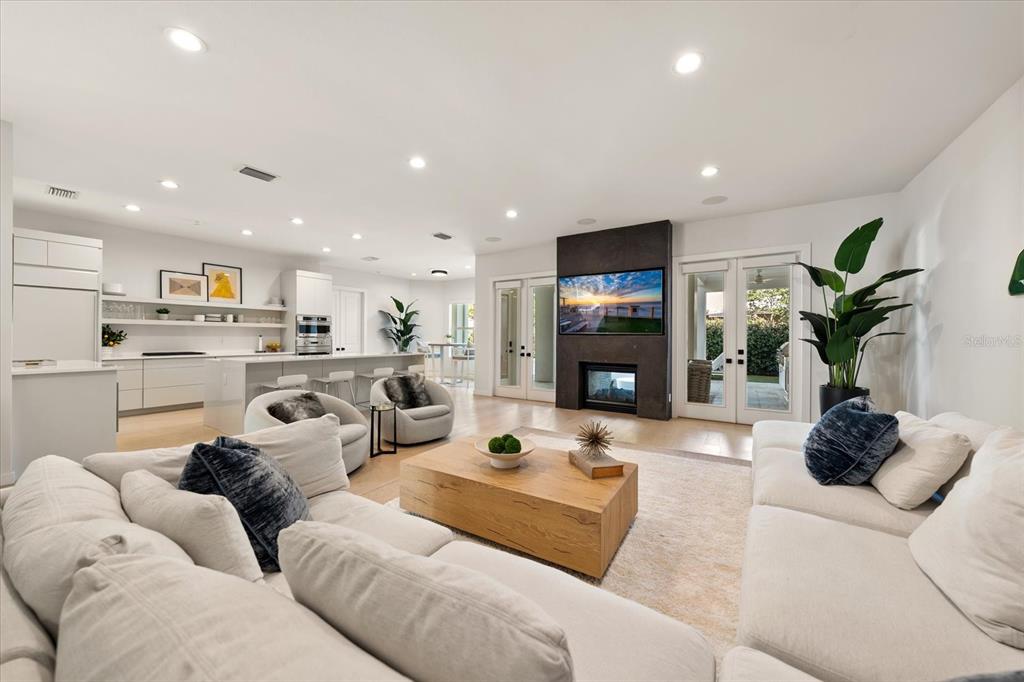3901 West Granada Street Tampa, FL 33629 - Photo 8 of 45 a living room with furniture and a fireplace