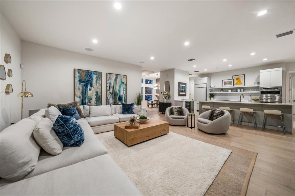 3901 West Granada Street Tampa, FL 33629 - Photo 9 of 45 a living room with furniture and kitchen view