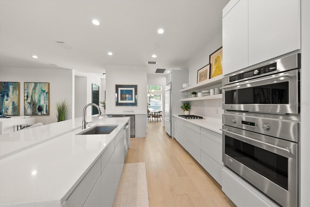 3901 West Granada Street Tampa, FL 33629 - Photo 10 of 45 a large white kitchen with stainless steel appliances