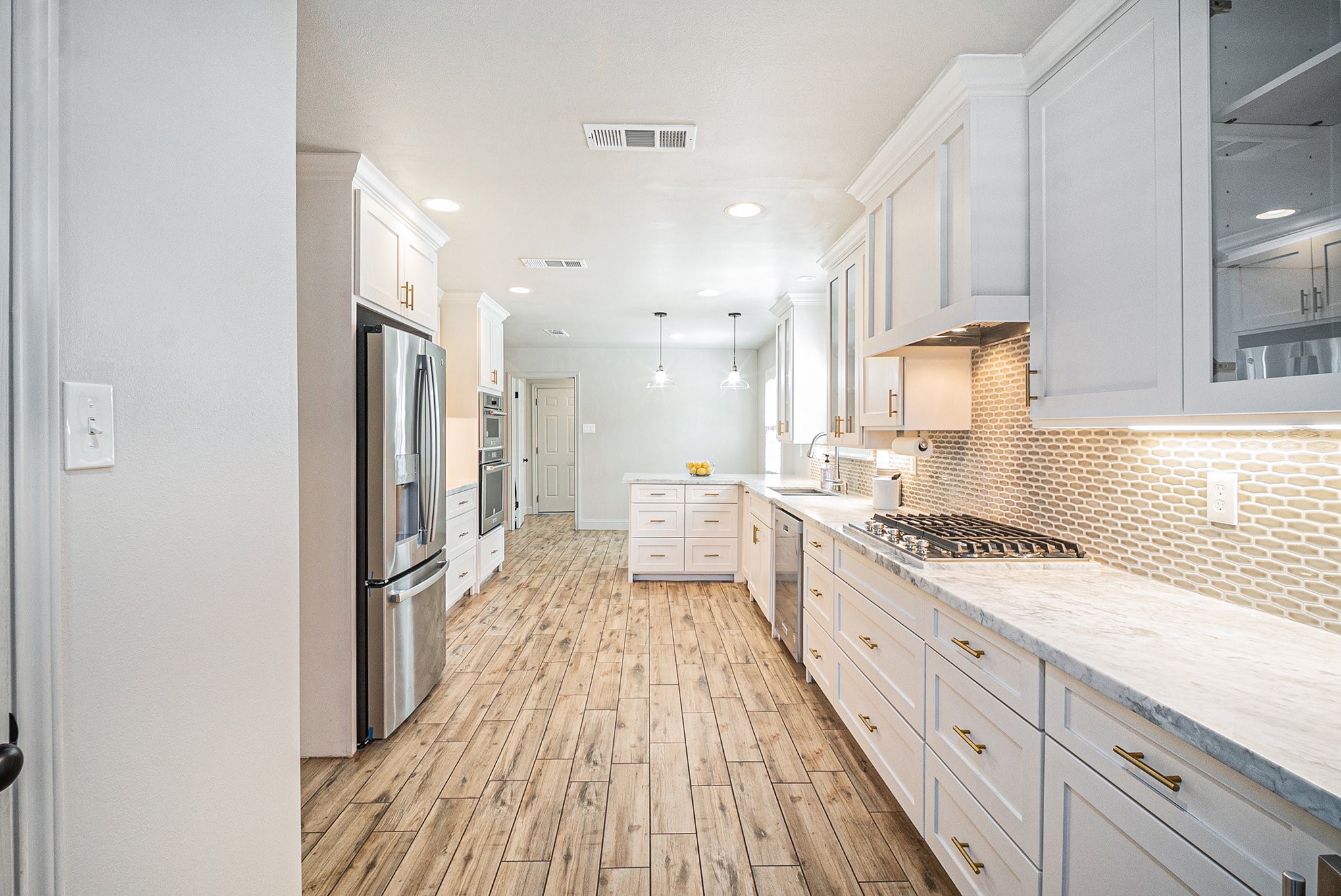 10602 Del Monte Drive Houston, TX 77042 - Photo 16 of 37 a large kitchen with a lot of counter space