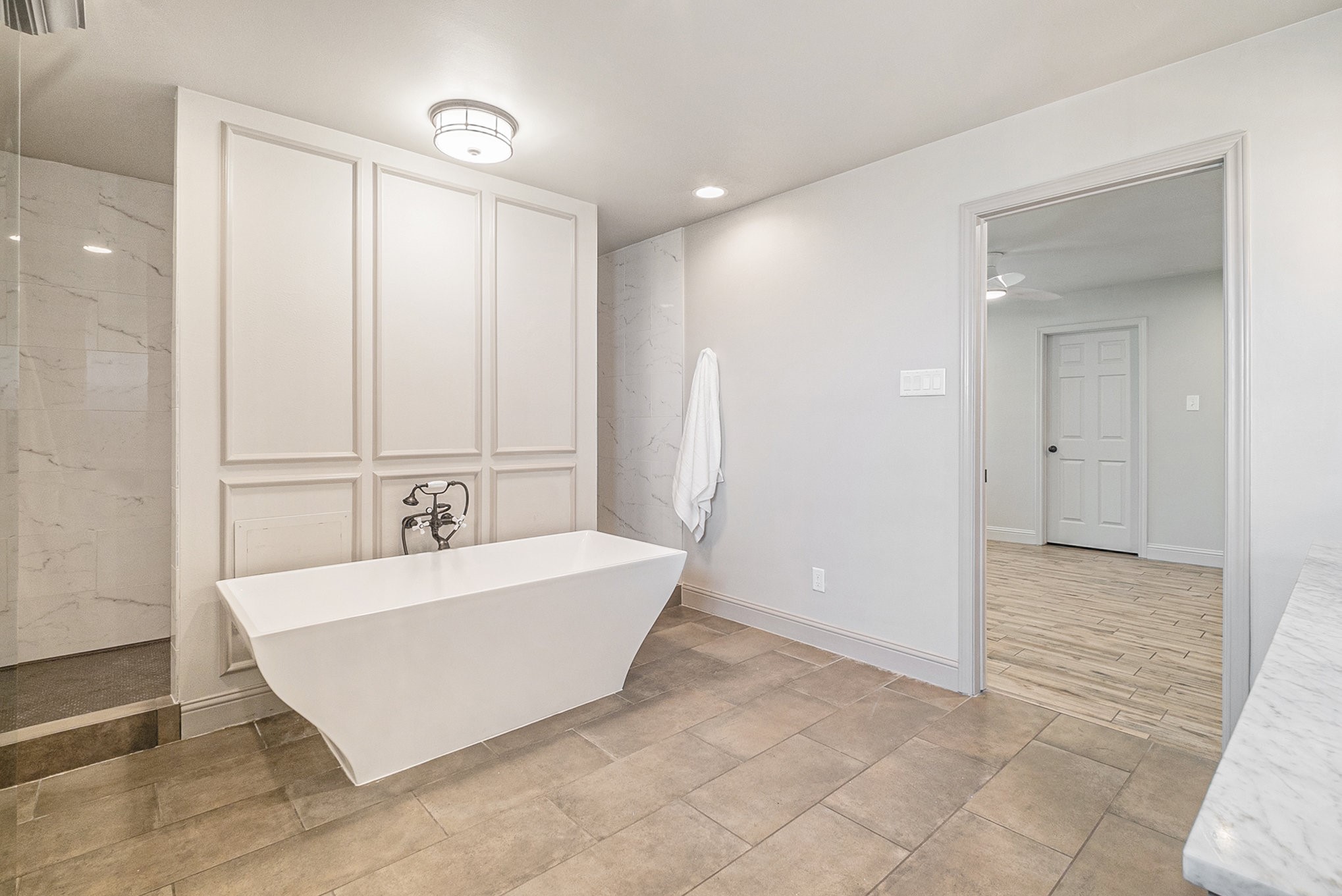 10602 Del Monte Drive Houston, TX 77042 - Photo 21 of 37 an empty room with white walls and cabinet