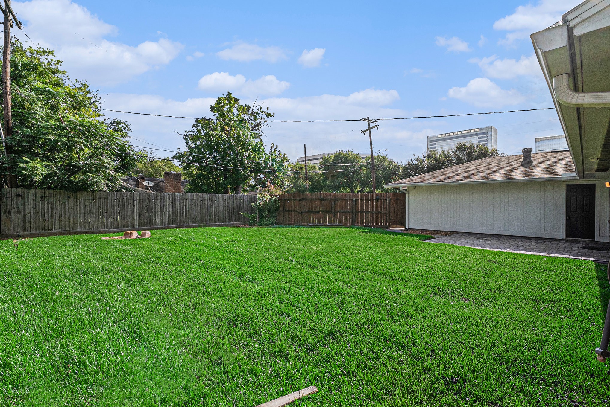 10602 Del Monte Drive Houston, TX 77042 - Photo 34 of 37 a view of a backyard with green space