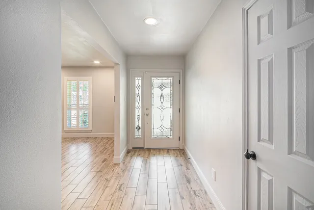 a view of entryway with wooden floor