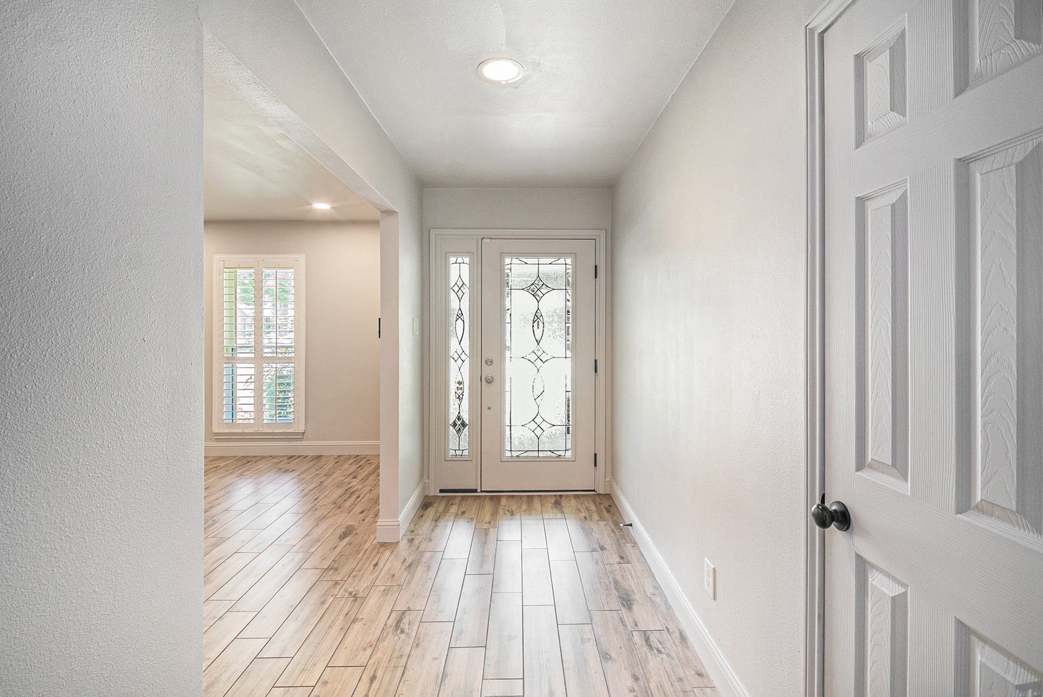 10602 Del Monte Drive Houston, TX 77042 - Photo 5 of 37 a view of entryway with wooden floor