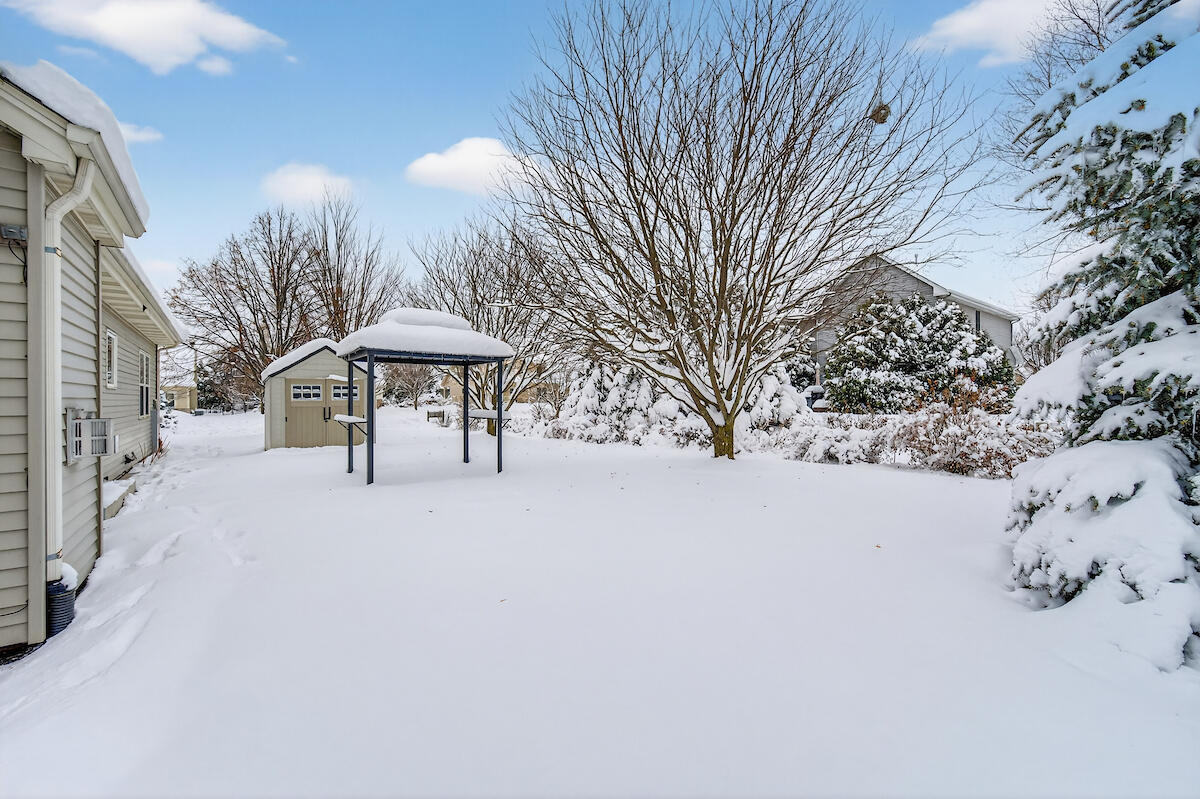 1706 Spring Meadow Lane Mount Pleasant, WI 53406 - Photo 4 of 39 Back