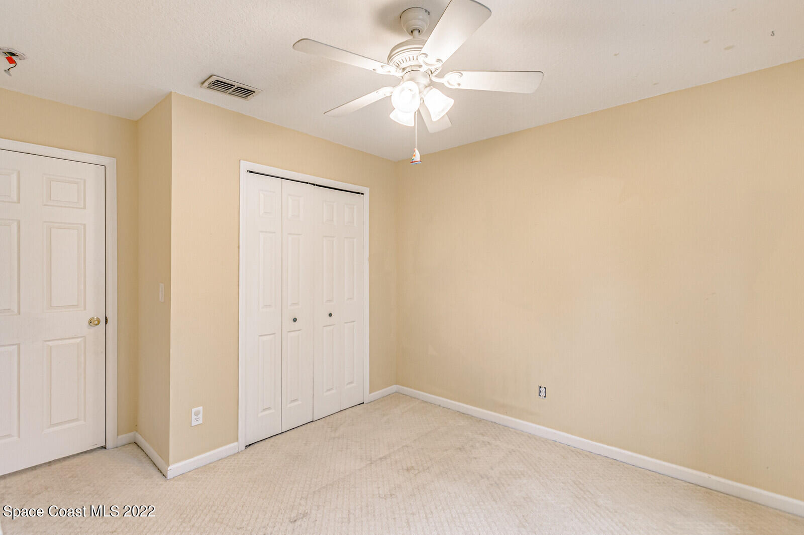 2765 Revolution Street, Unit 101 Melbourne, FL 32935 - Photo 22 of 48 Guest bedroom