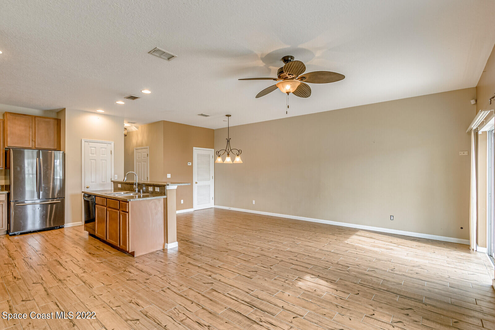 2765 Revolution Street, Unit 101 Melbourne, FL 32935 - Photo 9 of 48 Family room