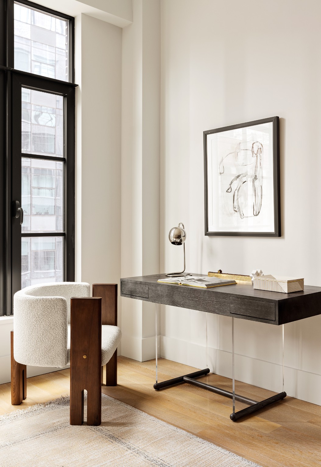 517 West 29th Street, Unit 3D Manhattan, NY 10001 - Photo 6 of 16 a room with a table chairs and wooden floor