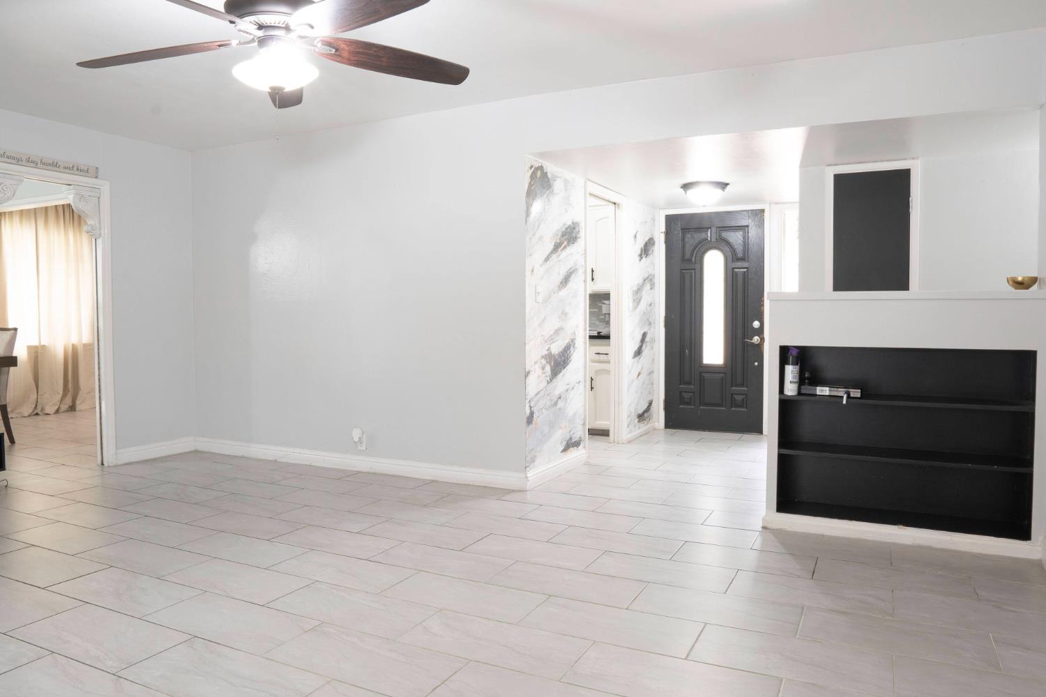 3662 North Angus Street Fresno, CA 93726 - Photo 22 of 67 a view of a livingroom with a fireplace