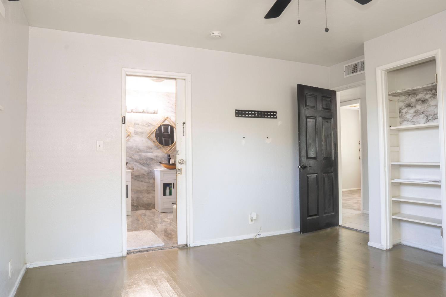 3662 North Angus Street Fresno, CA 93726 - Photo 35 of 67 wooden floor in a hall with an entryway and a living room