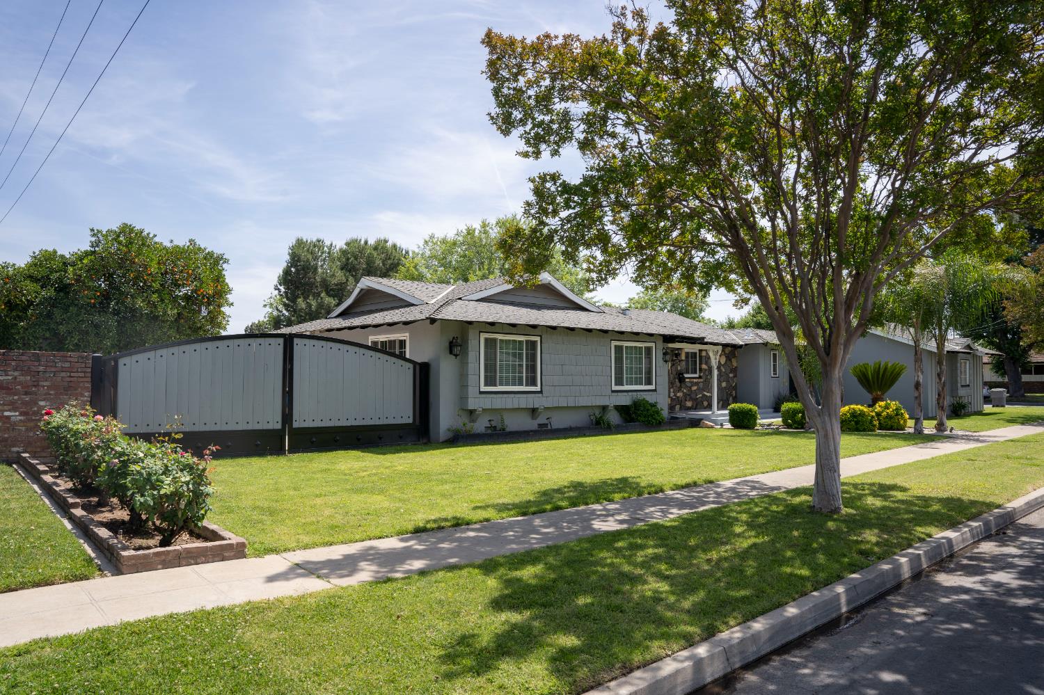 3662 North Angus Street Fresno, CA 93726 - Photo 67 of 67 a view of a house with a big yard