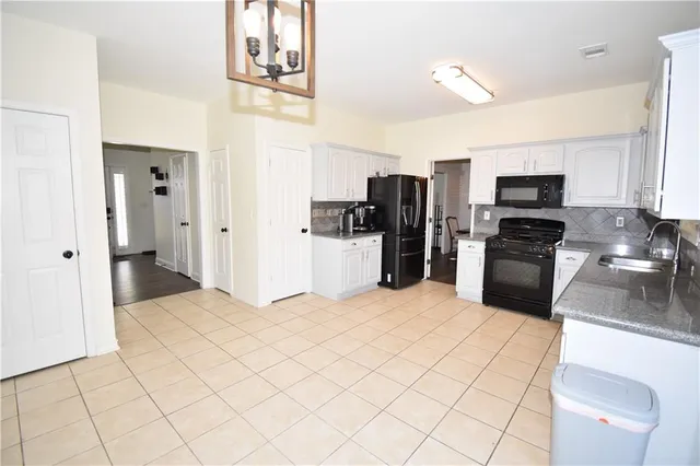 $400,000 | 550 Swan Creek Court Northwest, Suwanee, GA 30024