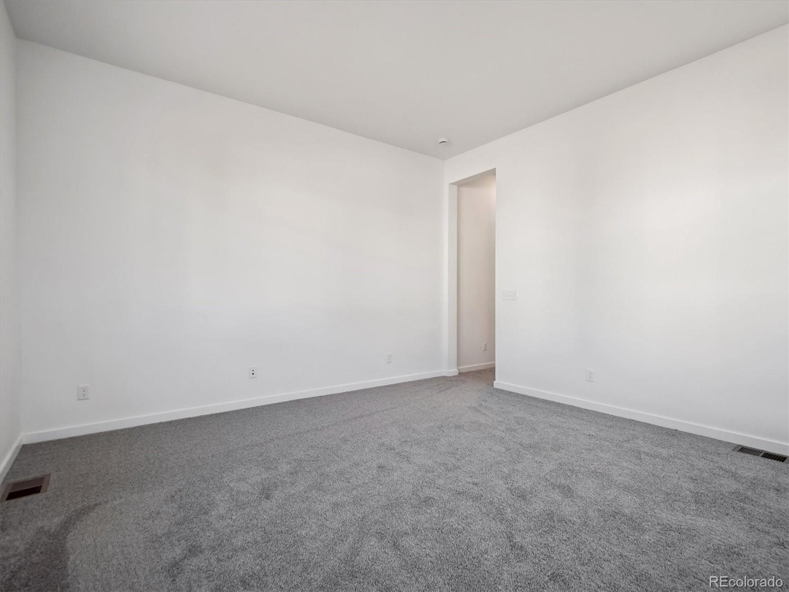9178 Gold Lace Place Littleton, CO 80129 - Photo 17 of 26 an empty room with an empty room