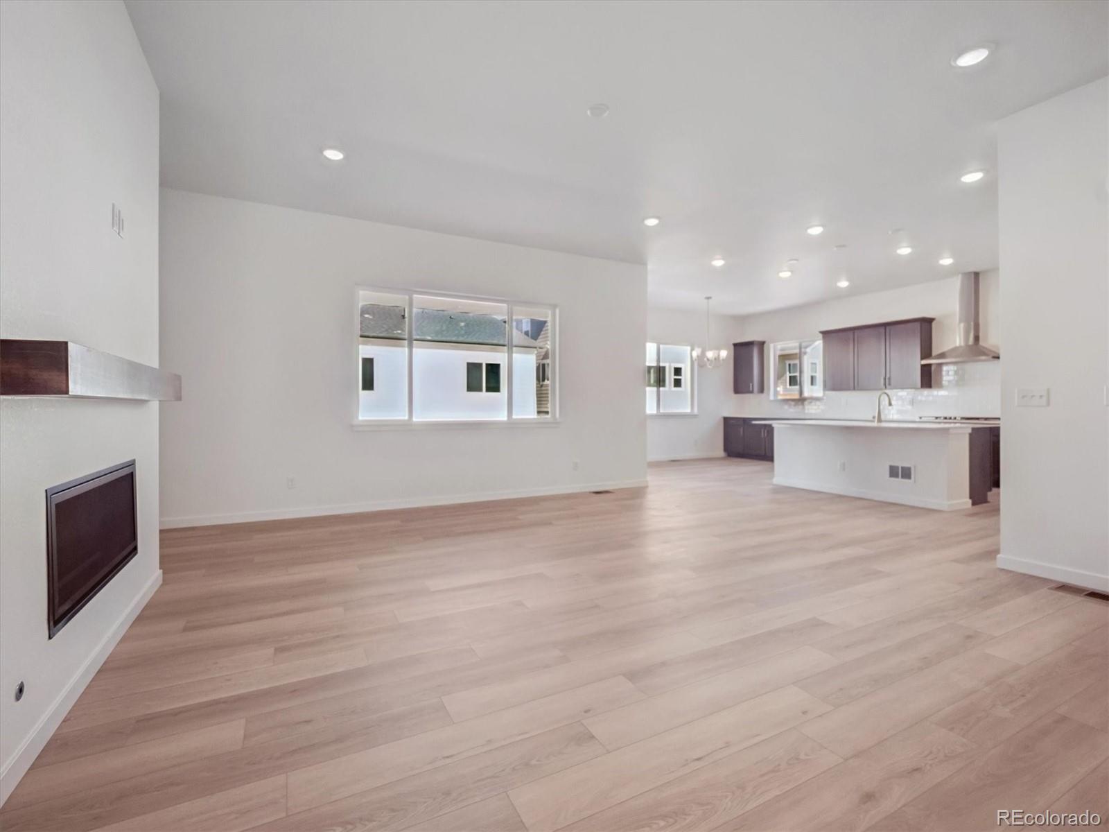 9178 Gold Lace Place Littleton, CO 80129 - Photo 7 of 26 a view of kitchen and kitchen with sink