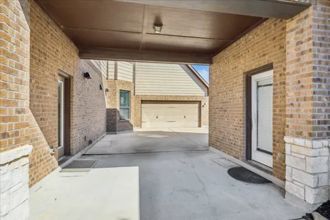 a kitchen with stainless steel appliances granite countertop a refrigerator stove top oven and sink