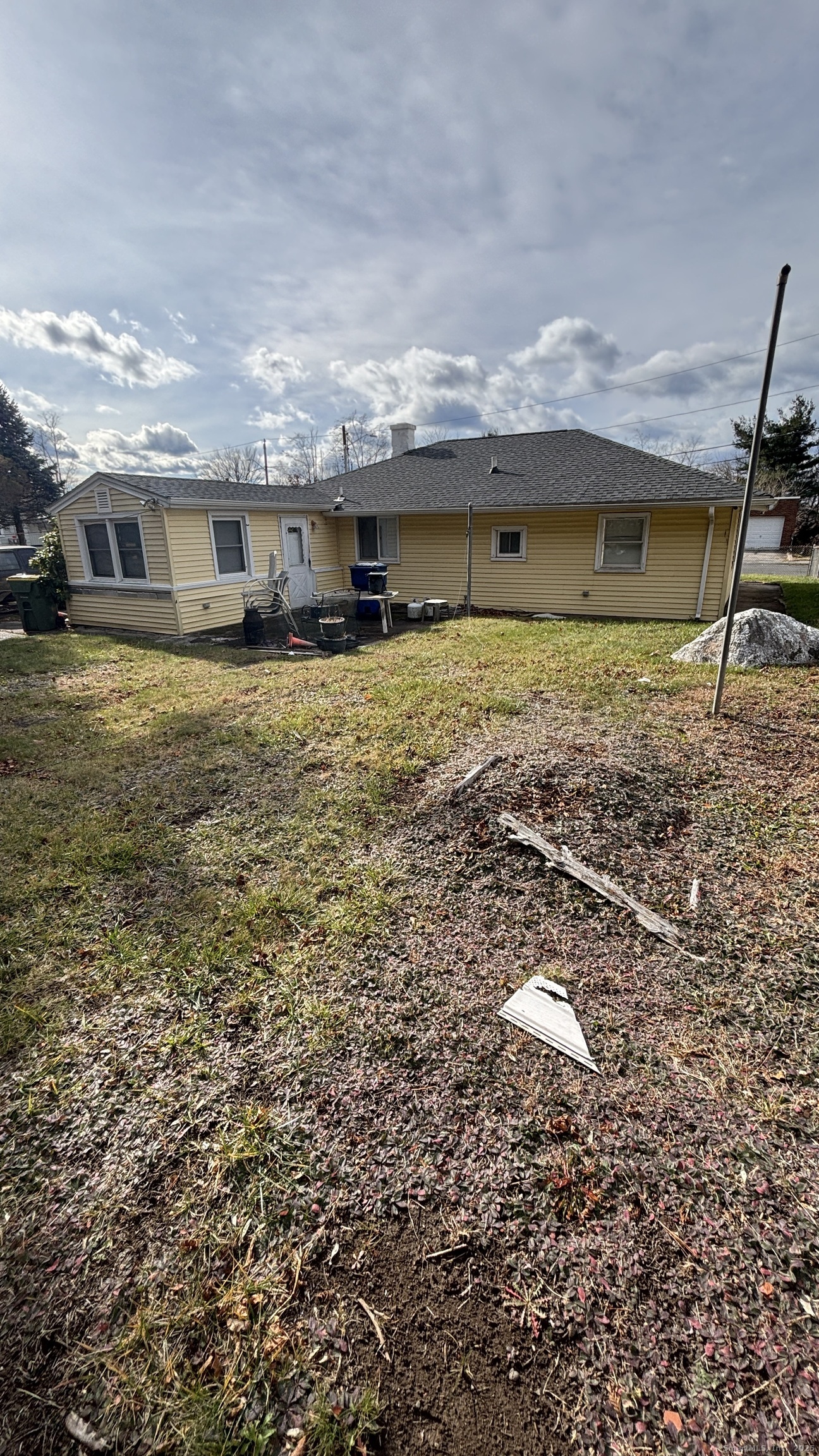 341 Oak Street Waterbury, CT 06705 - Photo 12 of 34 a front view of a house with a yard
