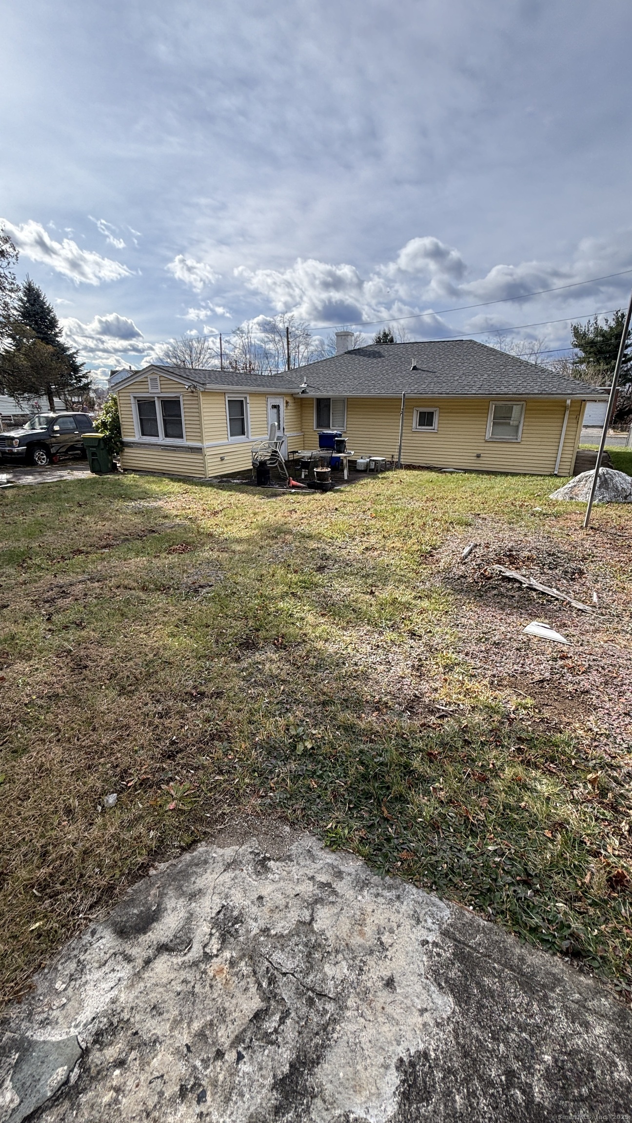 341 Oak Street Waterbury, CT 06705 - Photo 15 of 34 a front view of a house with a yard