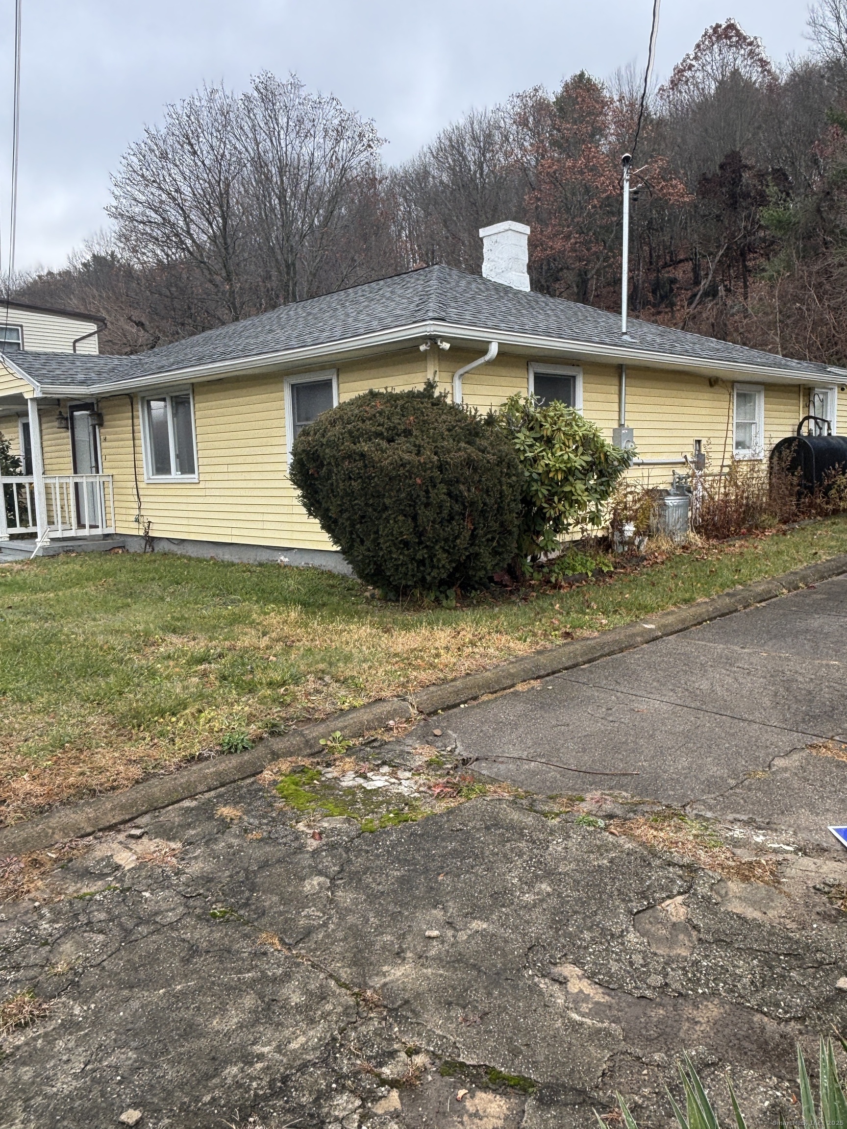 341 Oak Street Waterbury, CT 06705 - Photo 3 of 34 a view of a house with a yard