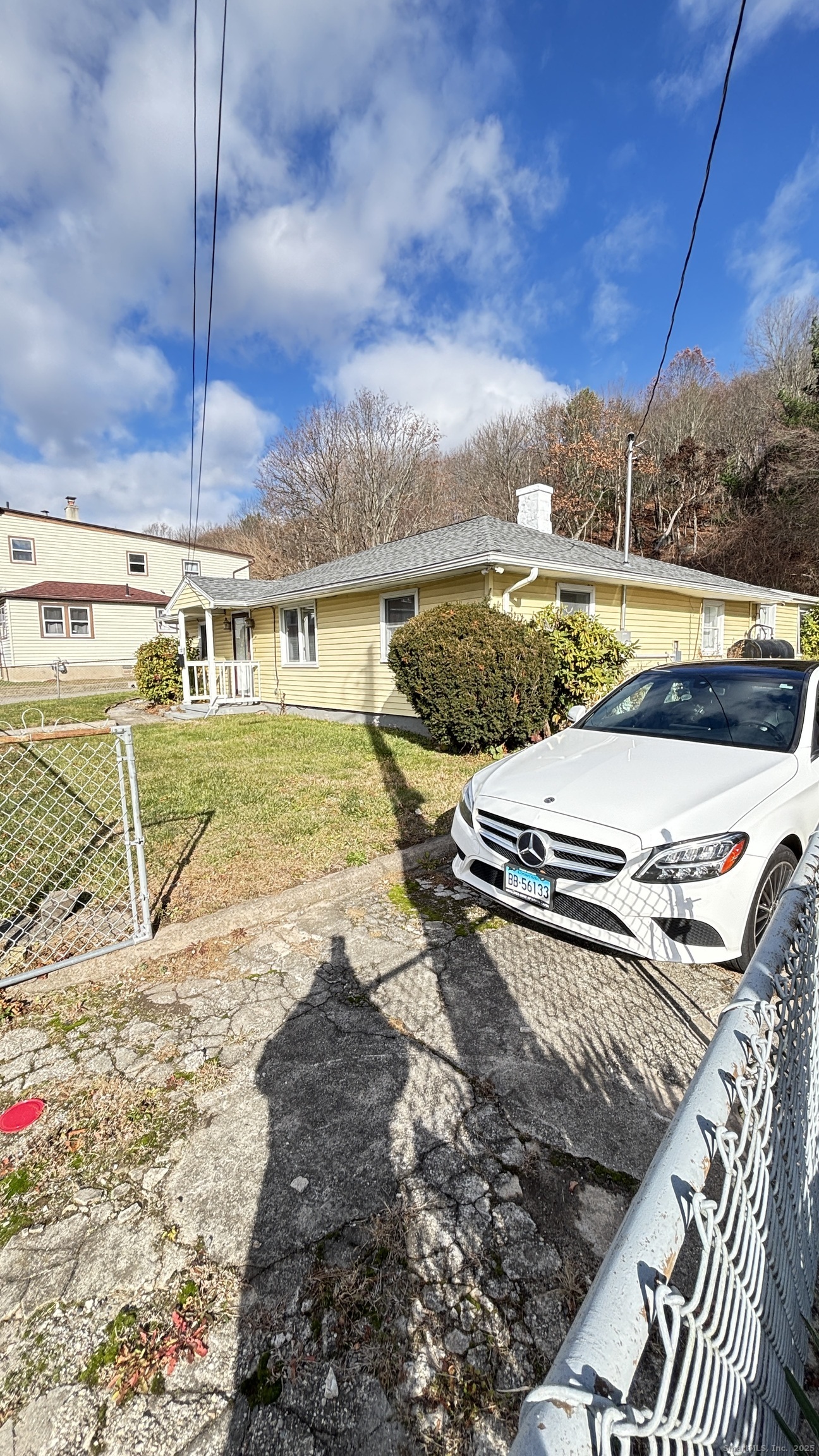 341 Oak Street Waterbury, CT 06705 - Photo 7 of 34 a view of a swimming pool with a yard