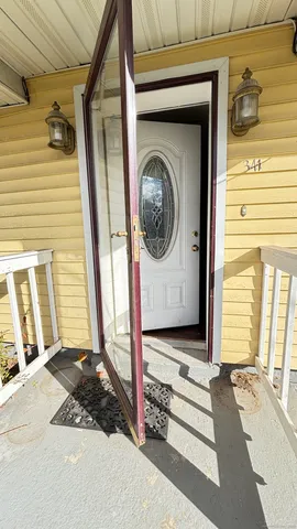 a front view of a house with a garage