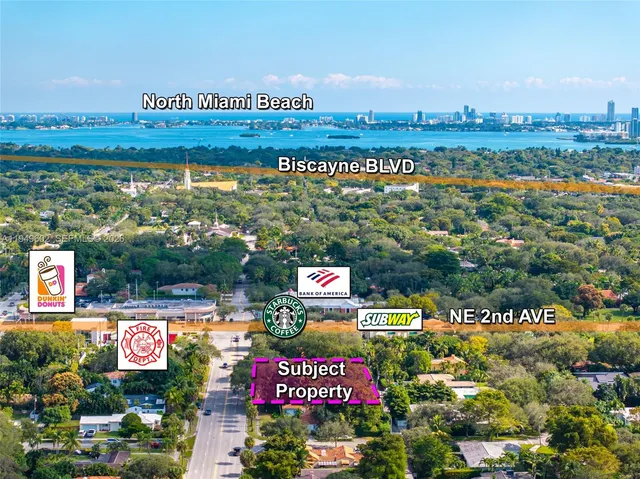 a view of a swimming pool in the backyard of house