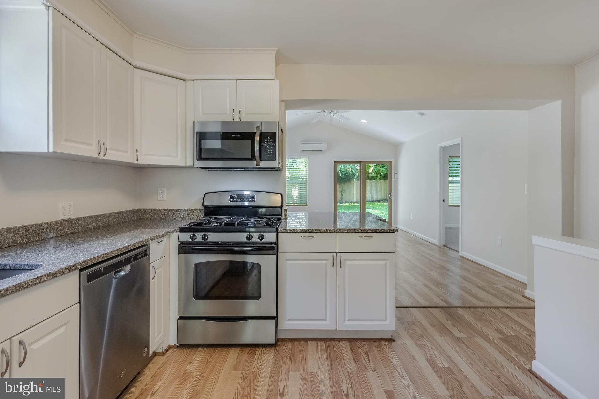 11603 Gail Street Silver Spring, MD 20902 - Photo 6 of 19 Updated kitchen with laminate floors