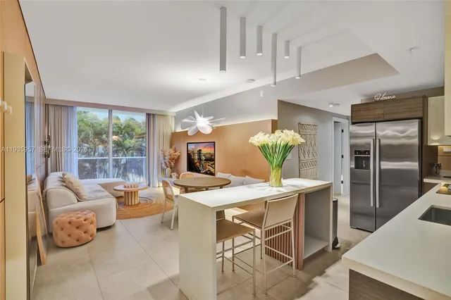 a room with a large window and a flat screen tv