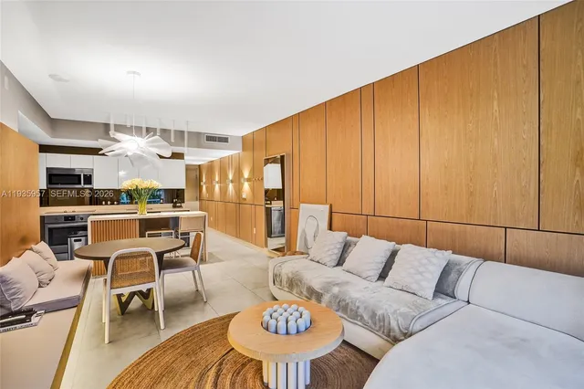 a living room with furniture and a window