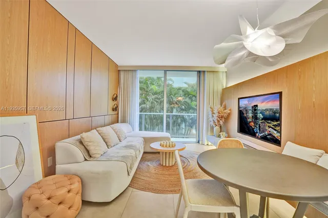 a kitchen with a stove a sink and a refrigerator