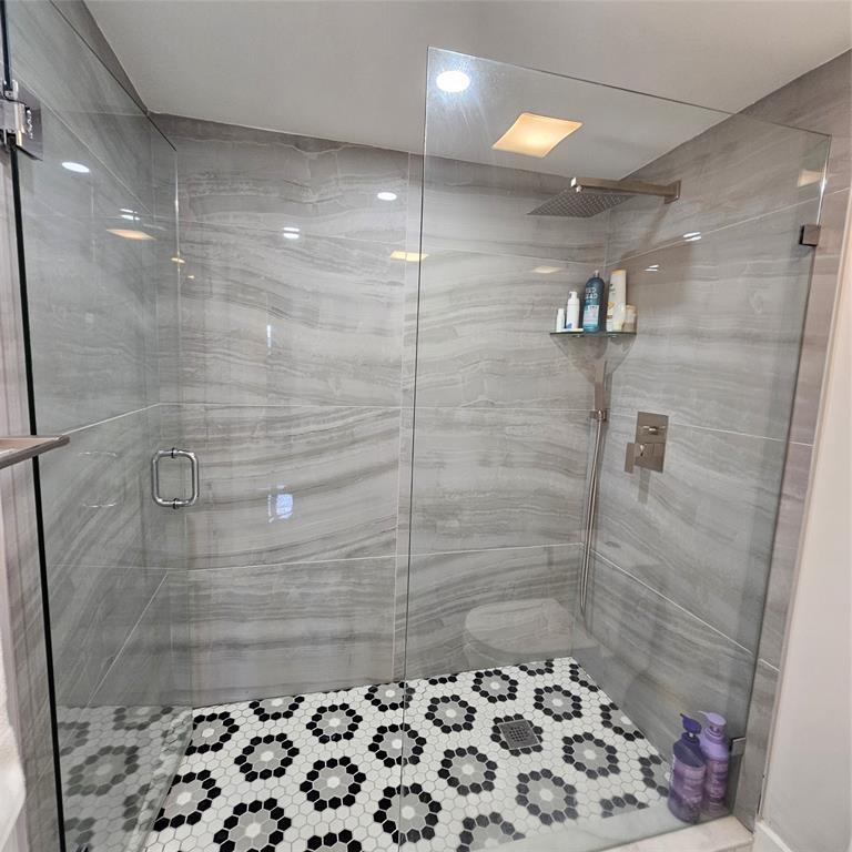 1705 Andros Isle, Unit C3 Coconut Creek, FL 33066 - Photo 18 of 36 a bathroom with a shower