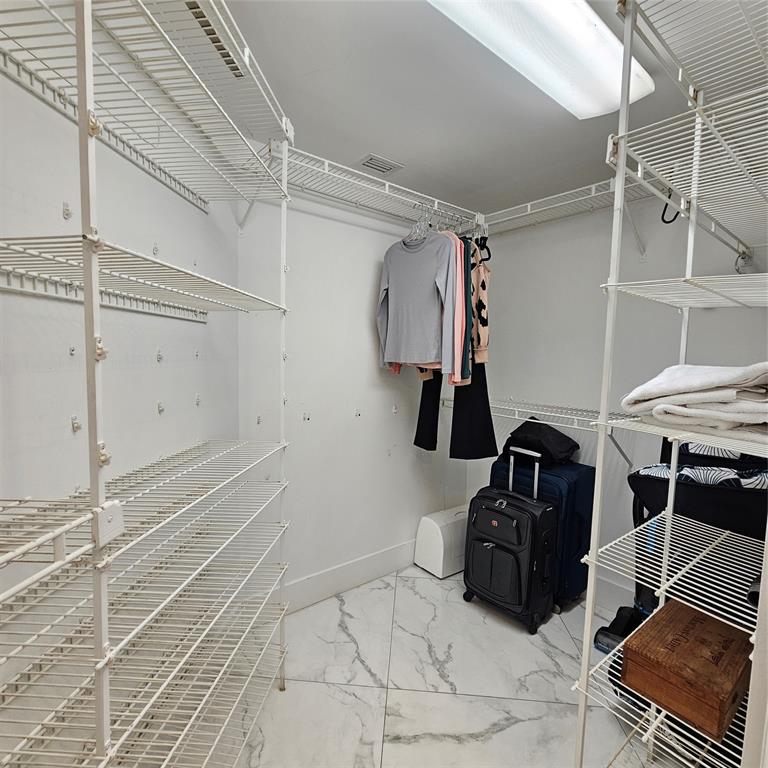 1705 Andros Isle, Unit C3 Coconut Creek, FL 33066 - Photo 21 of 36 a room with gym equipment